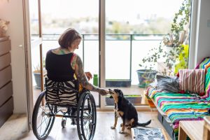 Woman living in an accessible home wheelchair user
