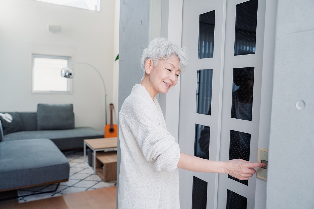 Woman at home using a lift